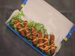 A photograph of 63 BURGER