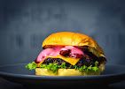 A photograph of FLAMES Burgers & More