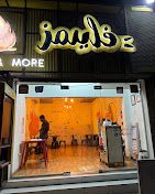 A photograph of FLAMES Burgers & More
