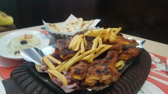 A photograph of Grill House Restaurant