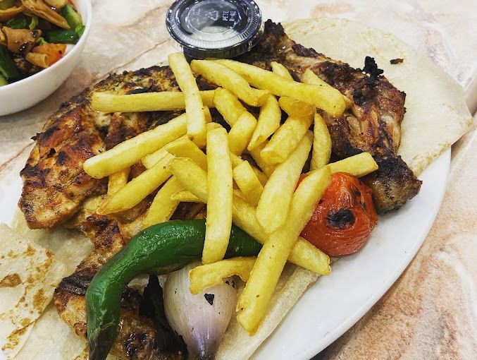 A photograph of Al Tarboosh Restaurant