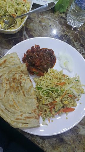A photograph of SPlCE SAHAM RESTAURANT KITCHEN