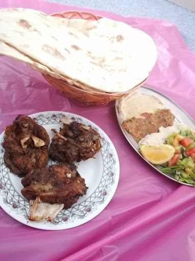 A photograph of SPlCE SAHAM RESTAURANT KITCHEN