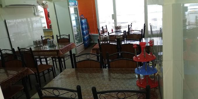 A photograph of Gujrati Food & Coffee Shop