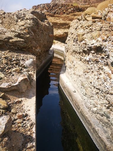 A photograph of Falaj of Wadi Al-Khatwa (Al-Qubeil)