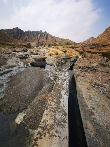 A photograph of Falaj of Wadi Al-Khatwa (Al-Qubeil)