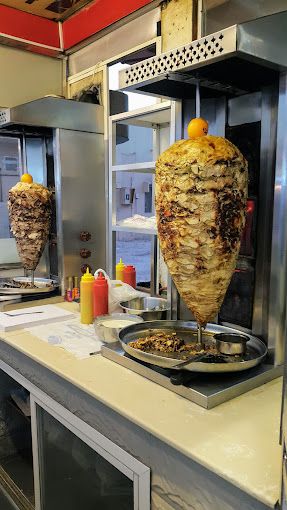 A photograph of Bin Zweiher Shawarma and juices