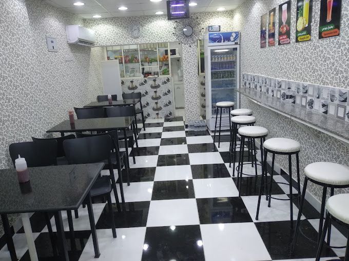 A photograph of Black & white coffee shop