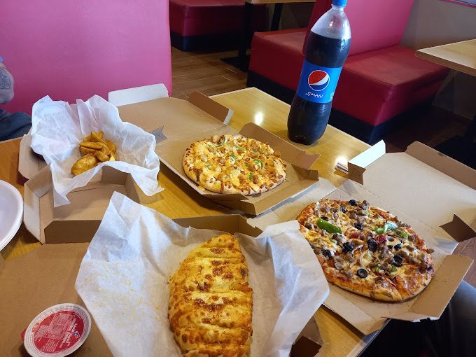 A photograph of Domino's Pizza