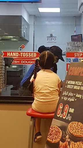 A photograph of Domino's Pizza