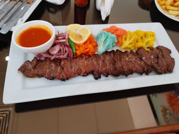 A photograph of Shiraz Nights Restaurant (Iranian Restaurant)