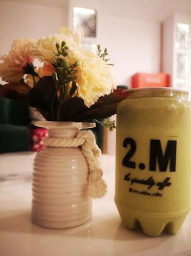 A photograph of 2.M two million coffee
