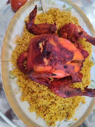 A photograph of Restaurant grill fish and Yemeni food