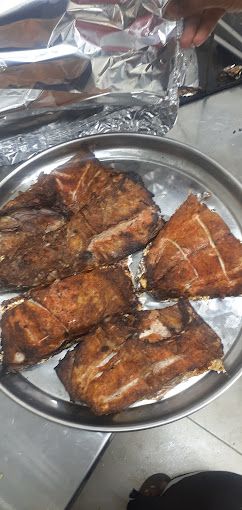 A photograph of Restaurant grill fish and Yemeni food