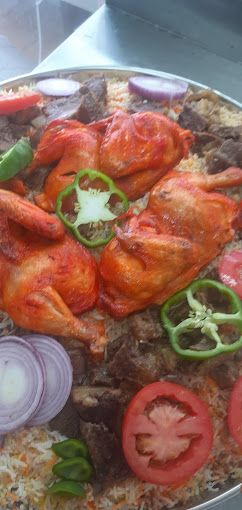 A photograph of Restaurant grill fish and Yemeni food