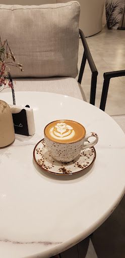 A photograph of VOLIERE COFFEE BOUTIQUE