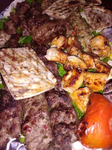 A photograph of Shawarma and caper grills