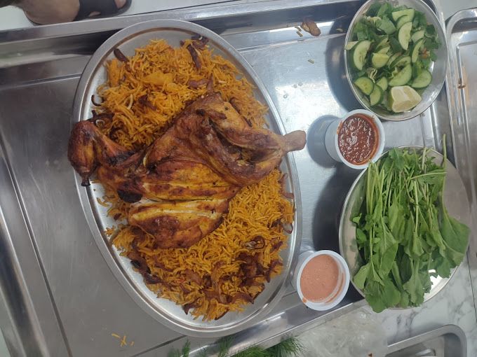A photograph of Ezz Kabsa and the compressed