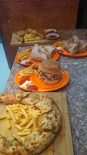 A photograph of Haddouk restaurant and pizza