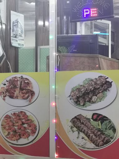 A photograph of Selling and grilling grills