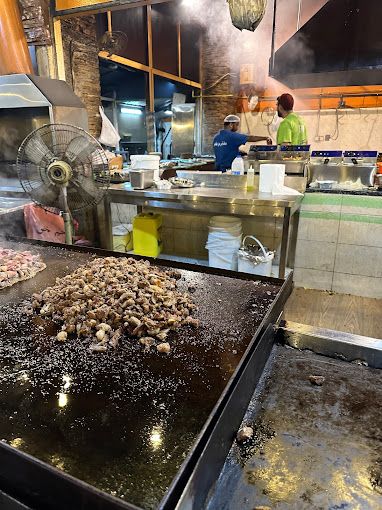 A photograph of Madabi Bin Amer Restaurant