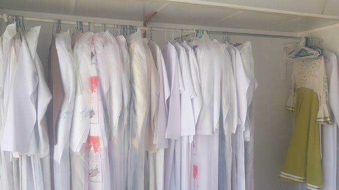 A photograph of Washing and Ironing Clothes