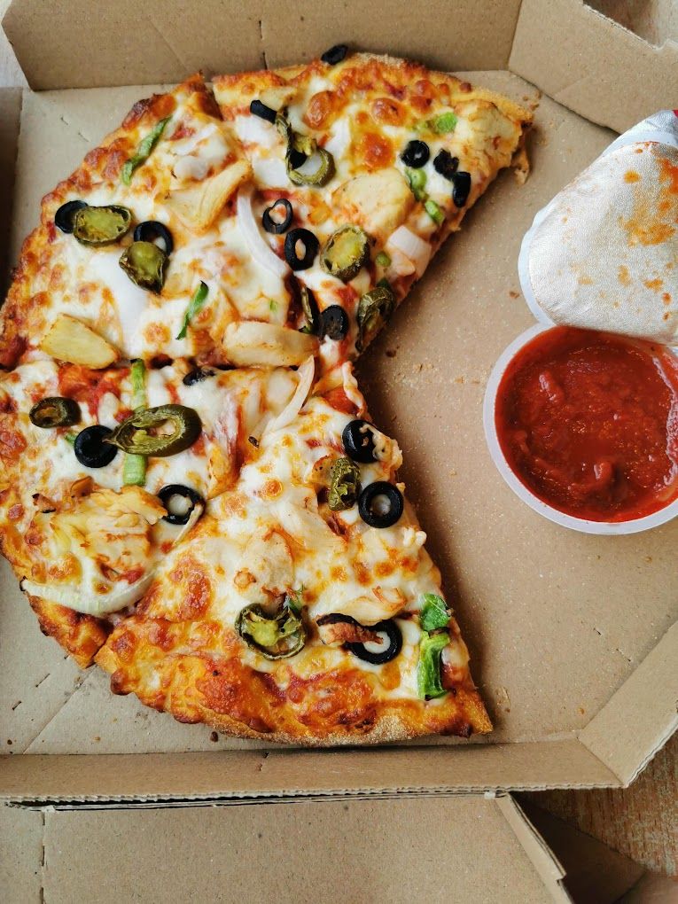 A photograph of Dominos Pizza