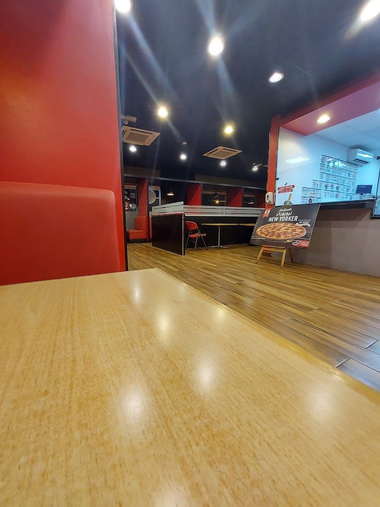 A photograph of Dominos Pizza