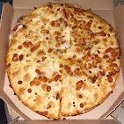 A photograph of Dominos Pizza