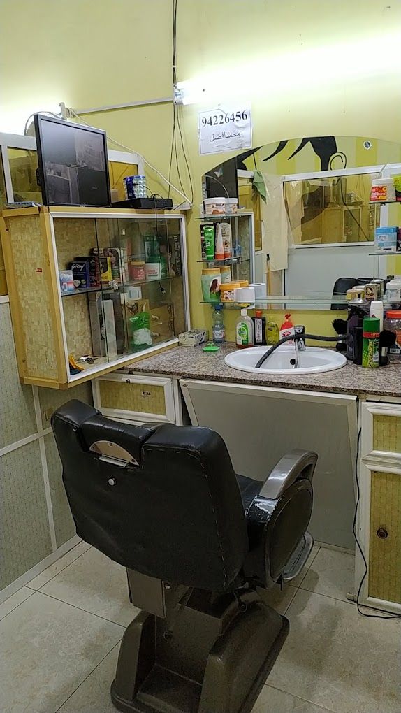 A photograph of ALNADAR BARBER SHOP