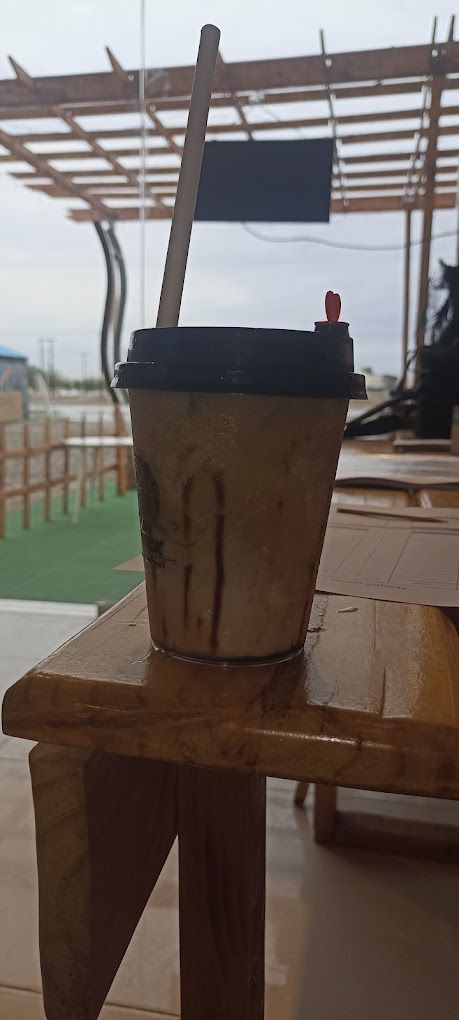 A photograph of peacock coffee