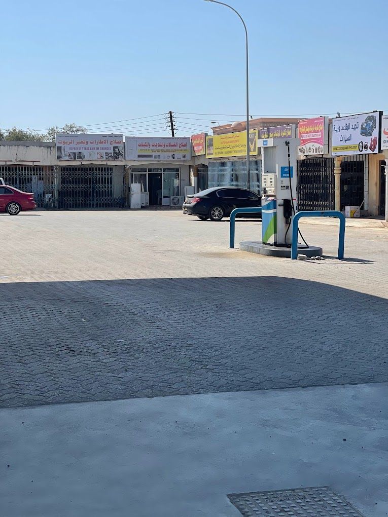 A photograph of Oman Oil Gas Station, Green Market