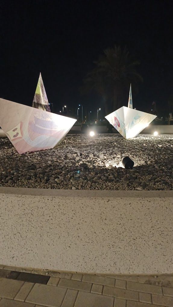 A photograph of Kuwaiti Dinar Monument