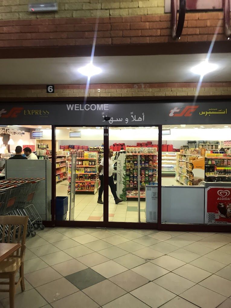 A photograph of Alpha 74 gas station