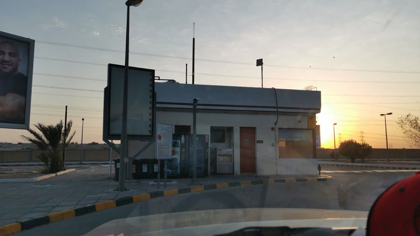 A photograph of Alpha 74 gas station